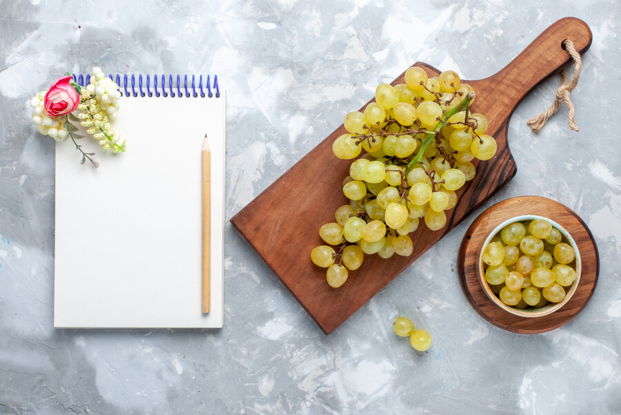 top-view-fresh-green-grapes-mellow-juicy-along-with-notepad-light-fruit-mellow-juice-fresh_00276.jpg