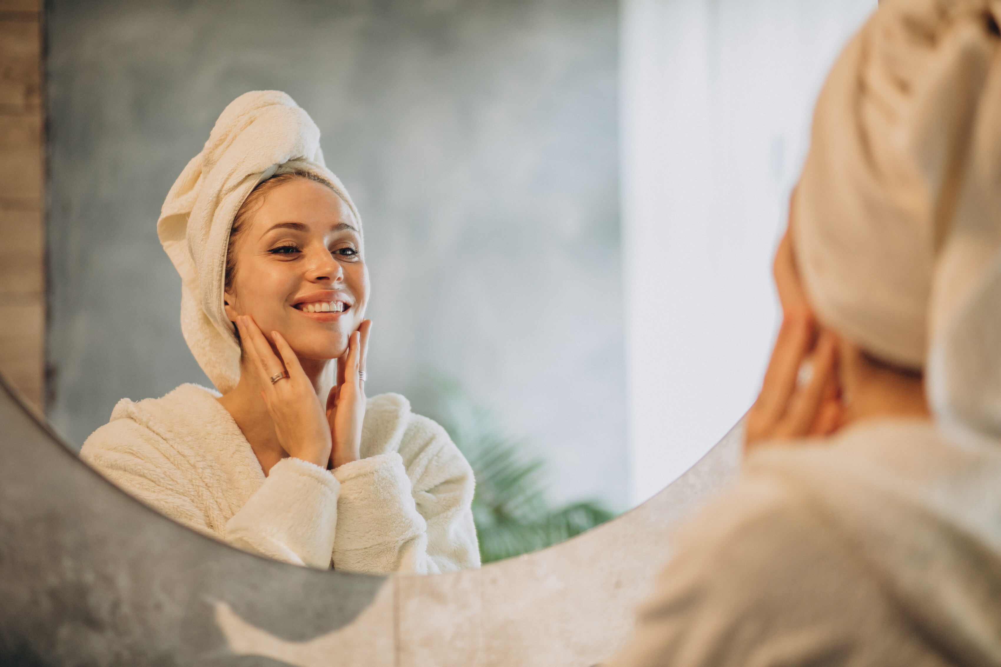 woman home applying cream mask e94bd